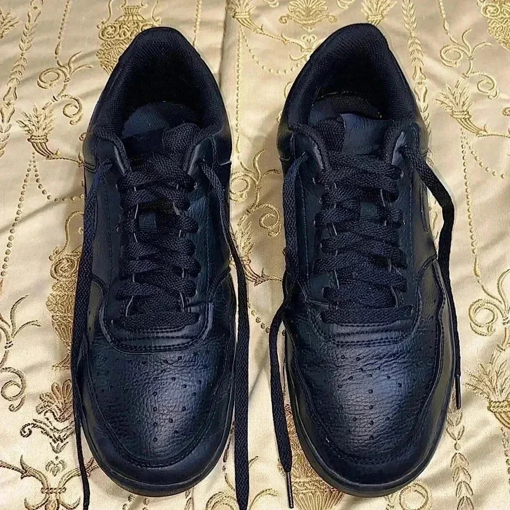 Nike’s Triple Black Court Vision Lo Sneakers